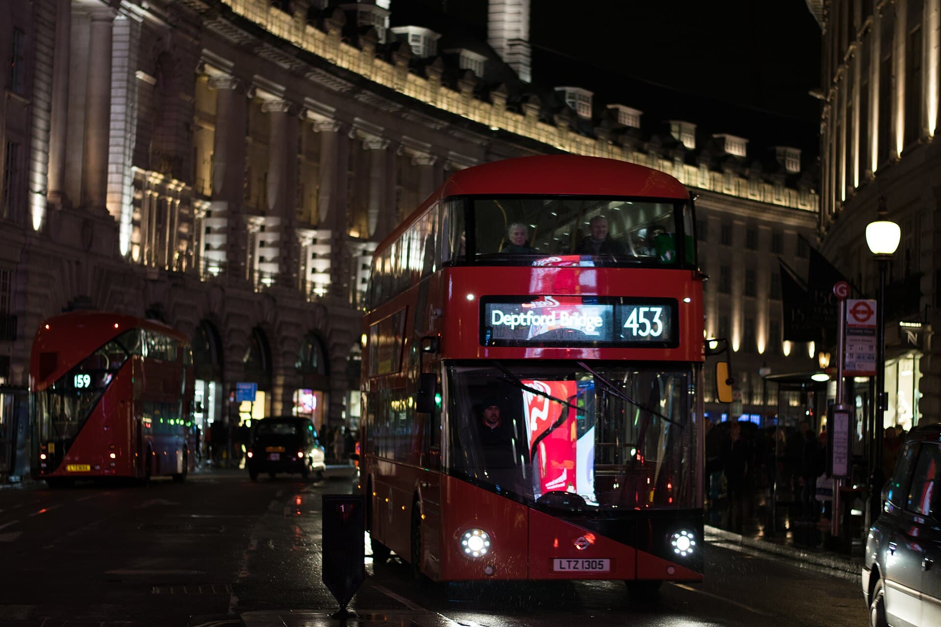 A red bus and the Underground, London